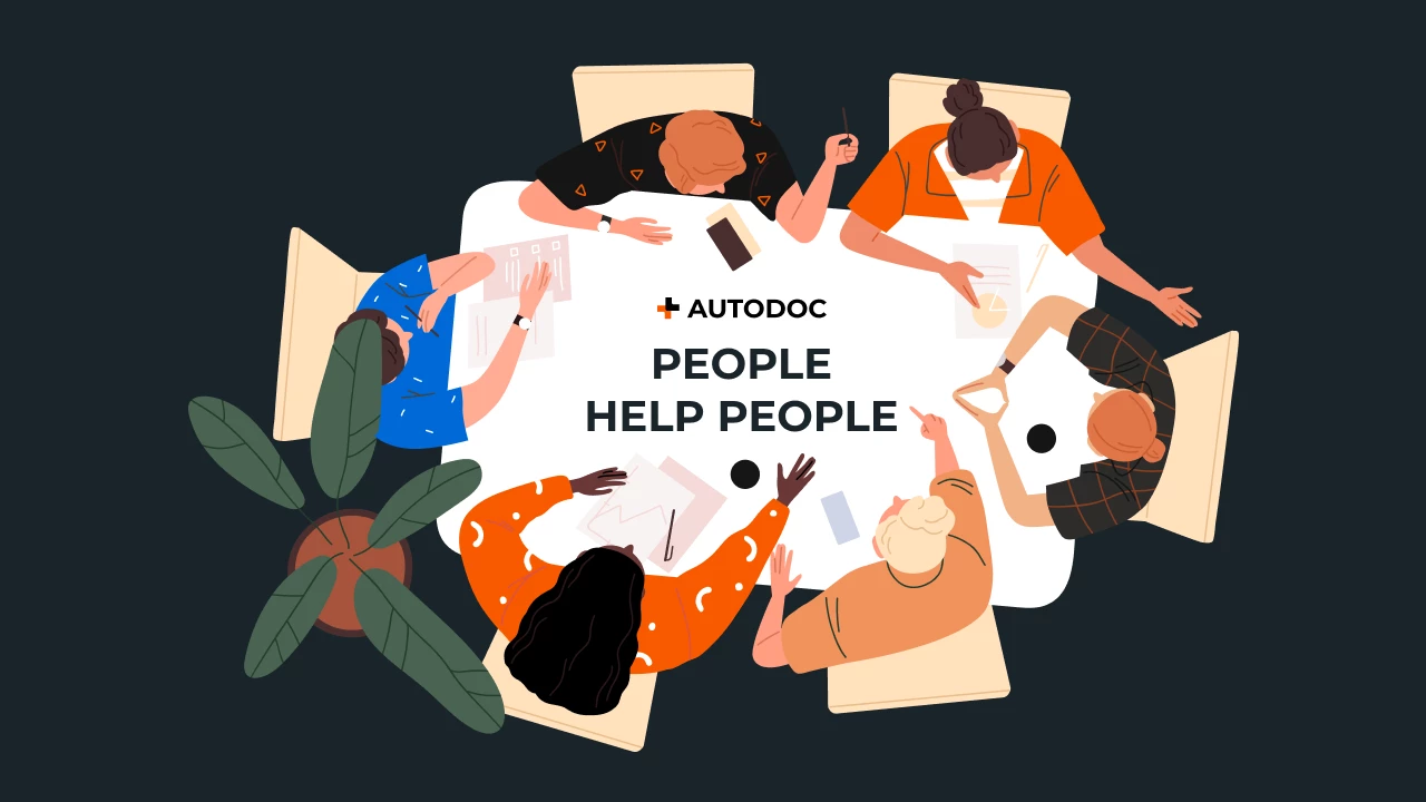 a group of people sitting around a table